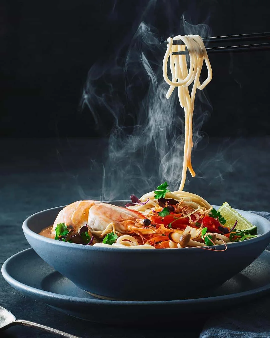 Steaming noodle dish, food photography